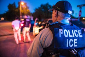 Photo of back of vest ICE Enforcement and Removal Operations (ERO) arrests criminal fugitives as part of Operation Cross Check. 2019.